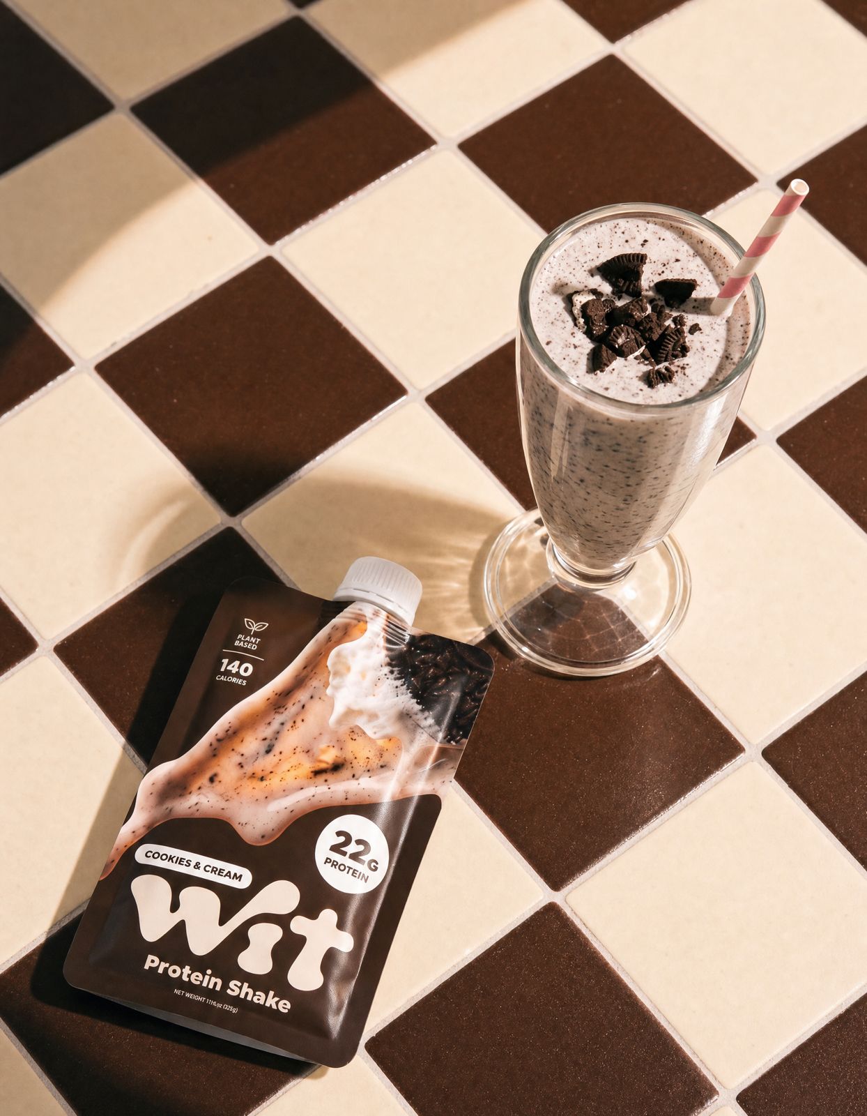 WIT protein shake on checkerboard tile